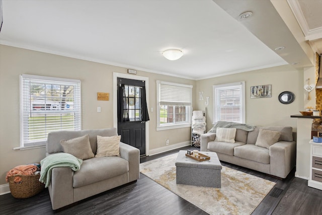 living area with crown molding, baseboards, and dark wood finished floors