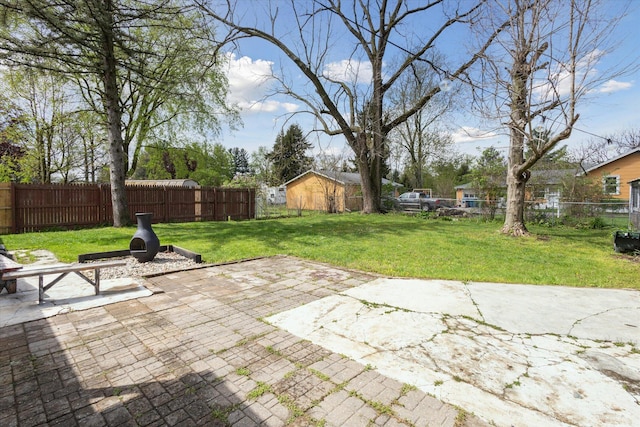 view of yard with a patio and a fenced backyard