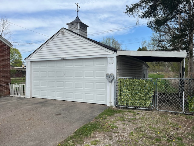 32230 5 Mile Rd, Livonia, MI 48154 - garage featuring a detached garage and fence