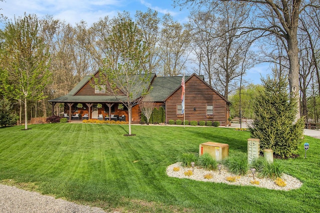 view of front facade featuring covered porch, a front lawn, and log exterior