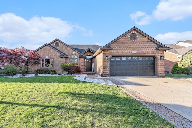 16511 Trailway Dr, Macomb, MI 48042 - view of front of house with brick siding, a garage, a front lawn, and driveway