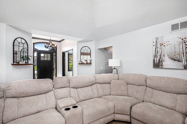 16511 Trailway Dr, Macomb, MI 48042 - living room with a chandelier