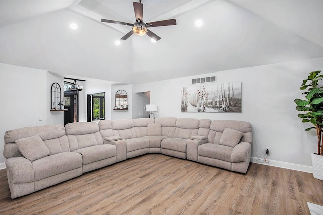 16511 Trailway Dr, Macomb, MI 48042 - living area with lofted ceiling, wood finished floors, recessed lighting, a ceiling fan, and baseboards