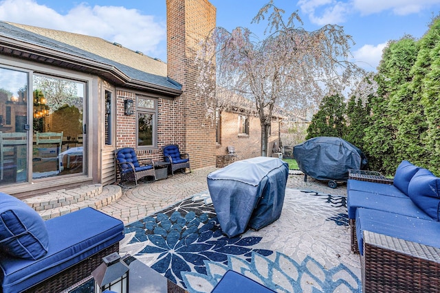16511 Trailway Dr, Macomb, MI 48042 - view of patio with grilling area and an outdoor hangout area