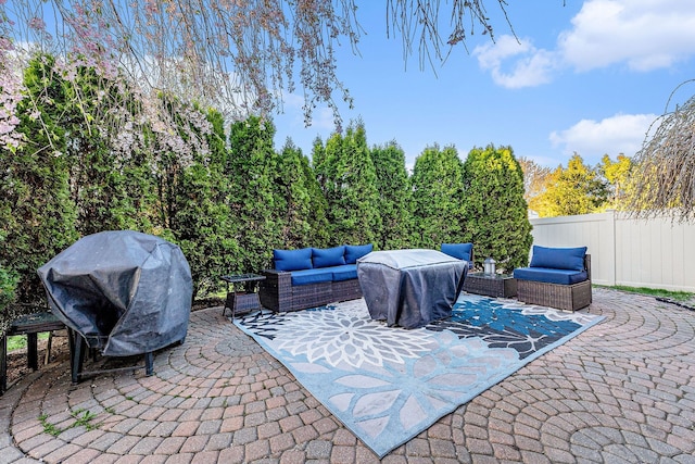 16511 Trailway Dr, Macomb, MI 48042 - view of patio / terrace featuring an outdoor living space, fence, and area for grilling