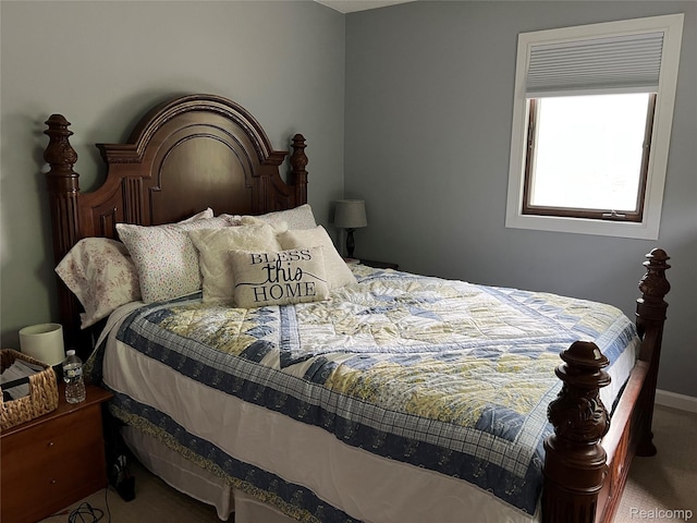 4564 Wildwood Rd, Alger, MI 48610 - bedroom with carpet floors and baseboards