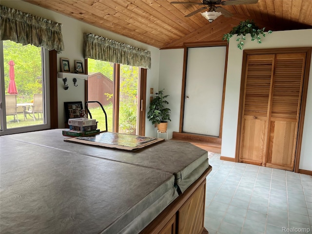 4564 Wildwood Rd, Alger, MI 48610 - kitchen featuring lofted ceiling, ceiling fan, wooden ceiling, light flooring, and brown cabinetry