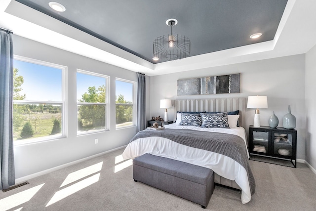 27142 Silo Dr, Saline, MI 48176 - bedroom featuring carpet flooring, a raised ceiling, multiple windows, and recessed lighting