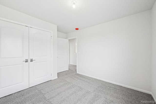 27142 Silo Dr, Saline, MI 48176 - unfurnished bedroom with carpet and a closet