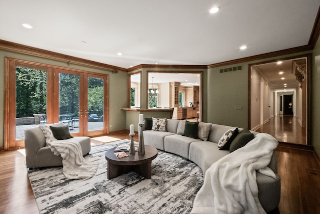 23755 Woodlynne Dr, Bingham Farms, MI 48025 - living area featuring ornamental molding, french doors, recessed lighting, wood finished floors, and baseboards