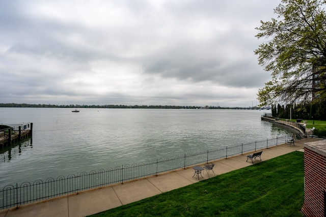 8162 E Jefferson Ave Unit 16A, Detroit, MI 48214 - water view featuring fence and a dock