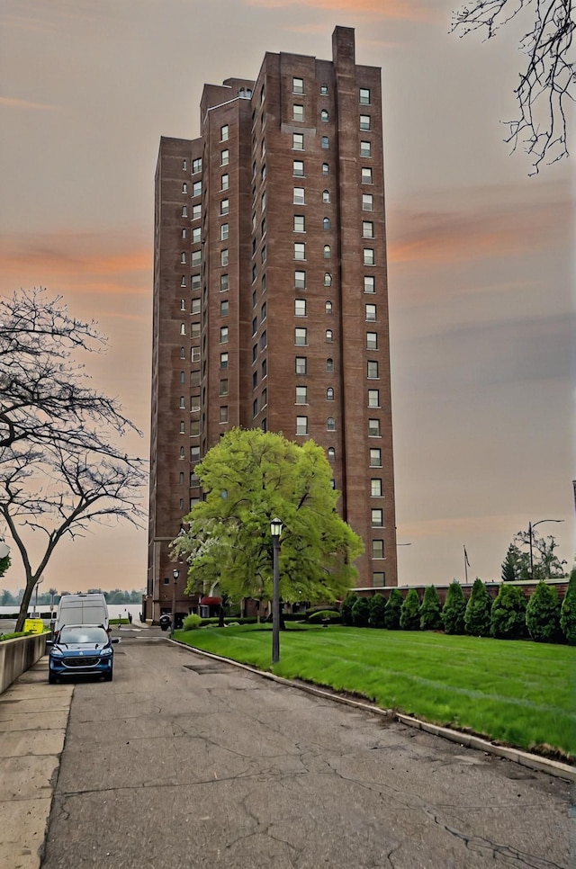 8162 E Jefferson Ave Unit 16A, Detroit, MI 48214 - view of property at dusk