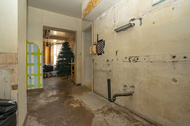 8162 E Jefferson Ave Unit 16A, Detroit, MI 48214 - hallway featuring unfinished concrete flooring