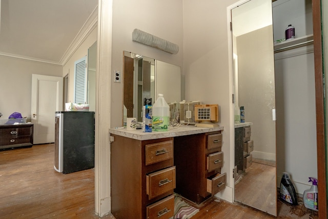 8162 E Jefferson Ave Unit 16A, Detroit, MI 48214 - bathroom with wood finished floors, crown molding, vanity, and baseboards