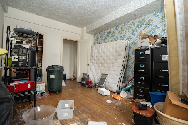 8162 E Jefferson Ave Unit 16A, Detroit, MI 48214 - misc room with wood-type flooring, wallpapered walls, and an ornate ceiling