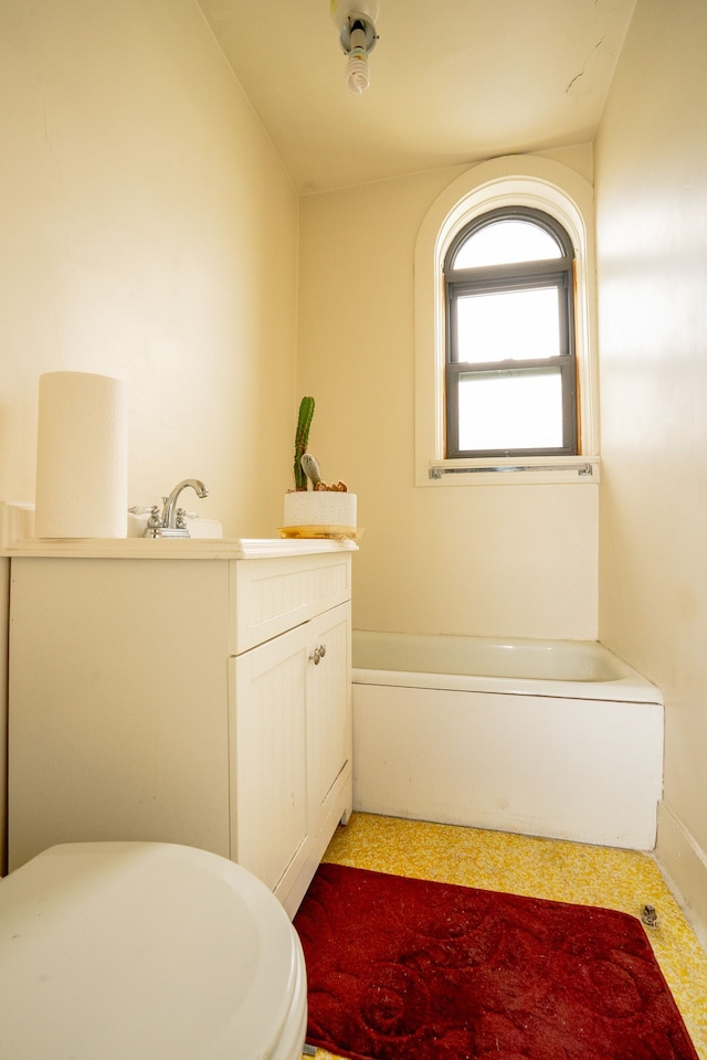 8162 E Jefferson Ave Unit 16A, Detroit, MI 48214 - full bathroom featuring a bath, vanity, and toilet