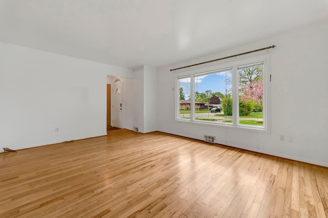 18377 Sunset St, Livonia, MI 48152 - unfurnished room with light wood-style floors and baseboards