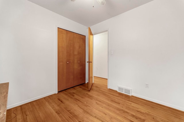 18377 Sunset St, Livonia, MI 48152 - unfurnished bedroom featuring light wood finished floors, baseboards, and a closet