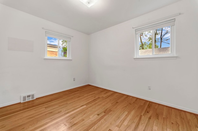 18377 Sunset St, Livonia, MI 48152 - spare room with baseboards and light wood-style floors