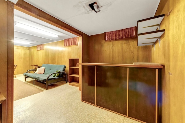 18377 Sunset St, Livonia, MI 48152 - living area featuring carpet flooring and wood walls