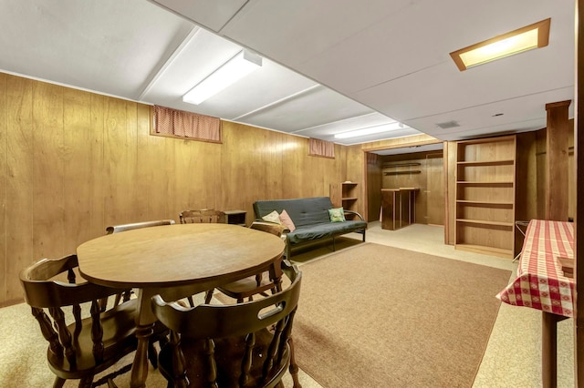 18377 Sunset St, Livonia, MI 48152 - rec room with wooden walls and carpet flooring