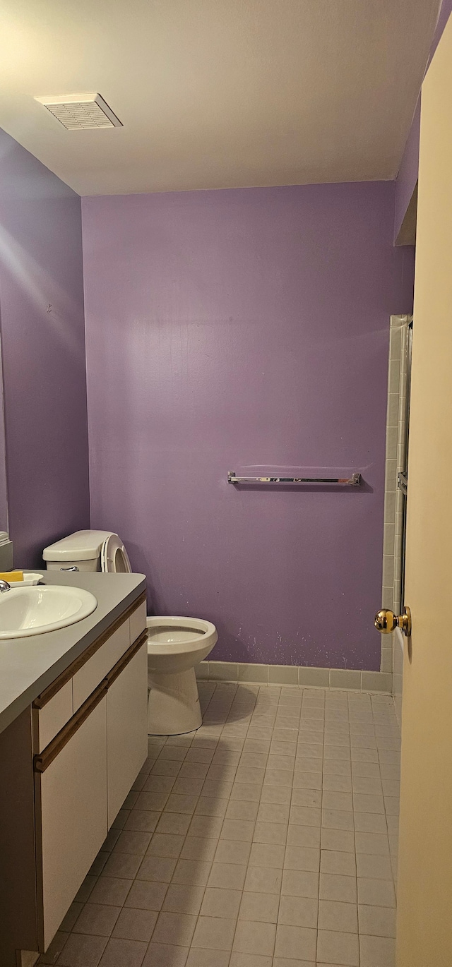 6660 Maple Lakes Dr, West Bloomfield, MI 48322 - full bathroom with tile patterned flooring, toilet, and vanity