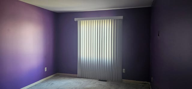 6660 Maple Lakes Dr, West Bloomfield, MI 48322 - empty room featuring carpet floors and baseboards