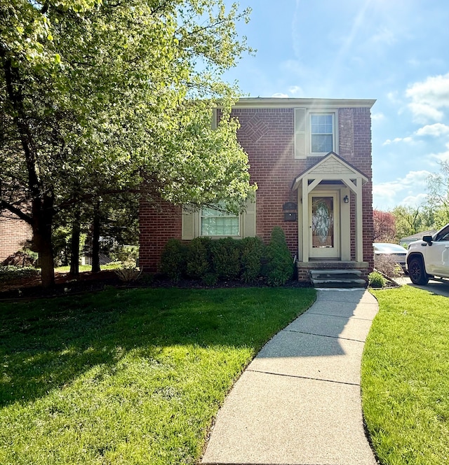 135 S Waverly St, Dearborn, MI 48124 - traditional-style home with brick siding and a front yard