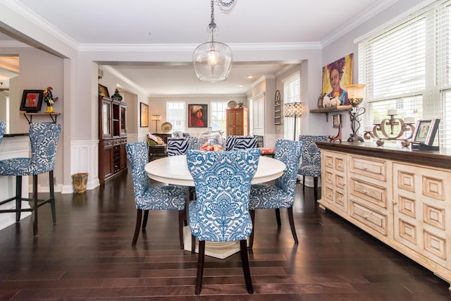 438 Filmore St, Canton, MI 48188 - dining room featuring wainscoting, dark wood-style flooring, crown molding, and a decorative wall