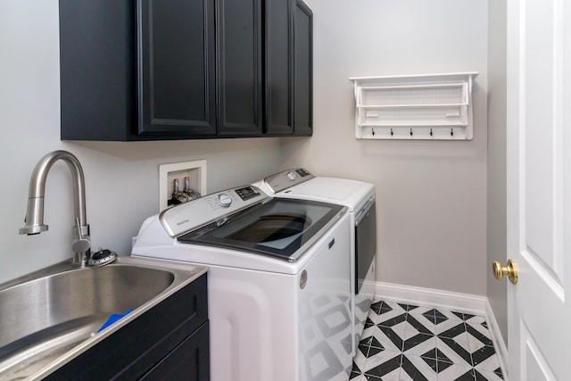 438 Filmore St, Canton, MI 48188 - laundry area with cabinet space, washing machine and clothes dryer, baseboards, and a sink