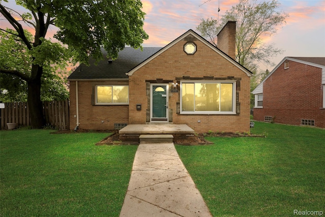 18470 Outer Dr, Dearborn, MI 48128 - bungalow featuring brick siding and a chimney