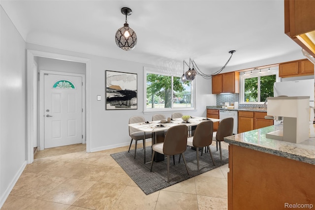 18470 Outer Dr, Dearborn, MI 48128 - dining area with baseboards and light tile patterned floors