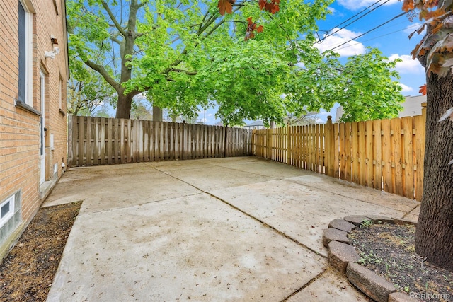 18470 Outer Dr, Dearborn, MI 48128 - fenced backyard featuring a patio area
