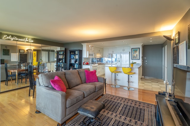 1300 E Lafayette St Unit 902, Detroit, MI 48207 - living room featuring light wood finished floors