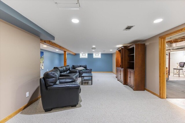 living area featuring light colored carpet, visible vents, and recessed lighting