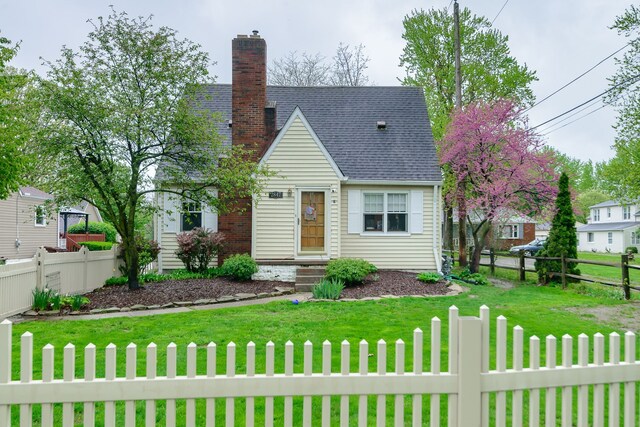2847 N Custer Rd, Monroe, MI 48162 - view of front of house with a chimney and roof with shingles