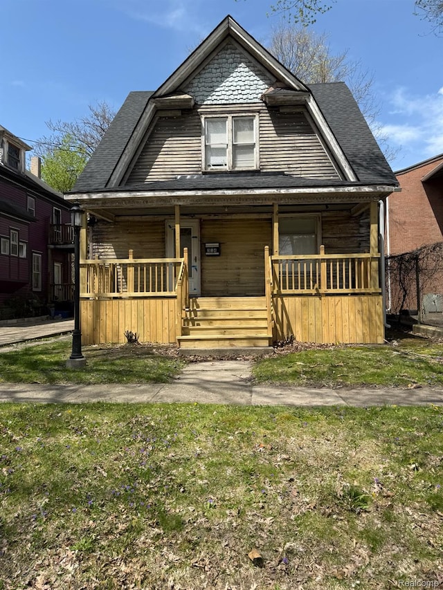 314 W 2nd Ave, Flint, MI 48503 - view of front facade featuring covered porch and a shingled roof