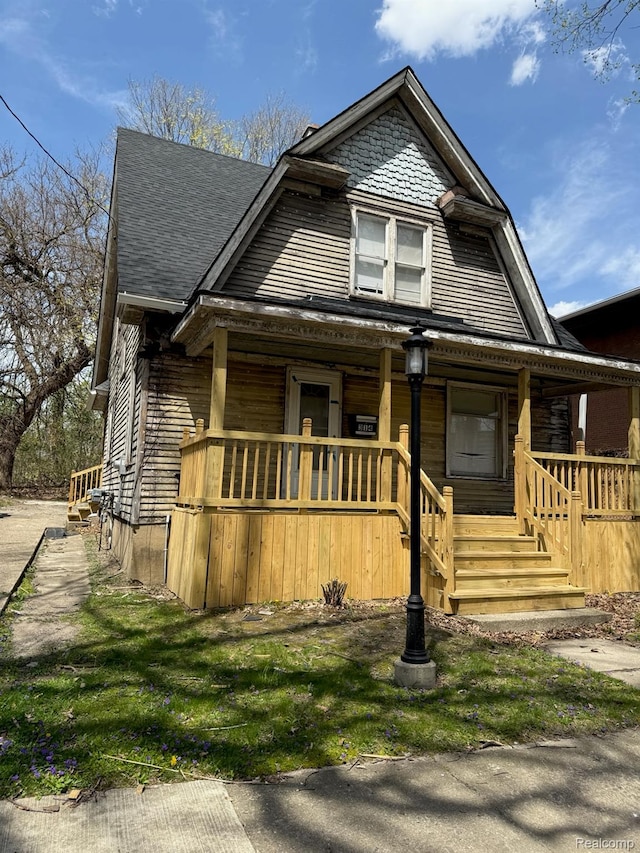 314 W 2nd Ave, Flint, MI 48503 - view of front of house featuring covered porch and a shingled roof