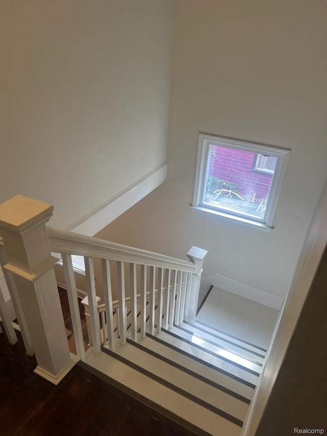 314 W 2nd Ave, Flint, MI 48503 - stairs featuring wood finished floors
