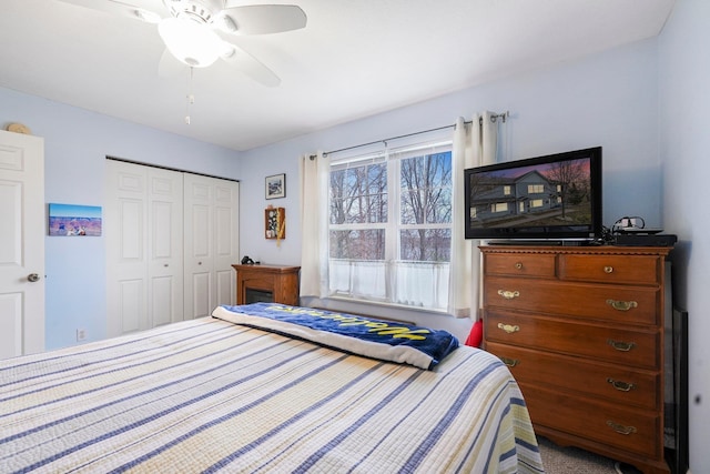 bedroom with a closet and a ceiling fan