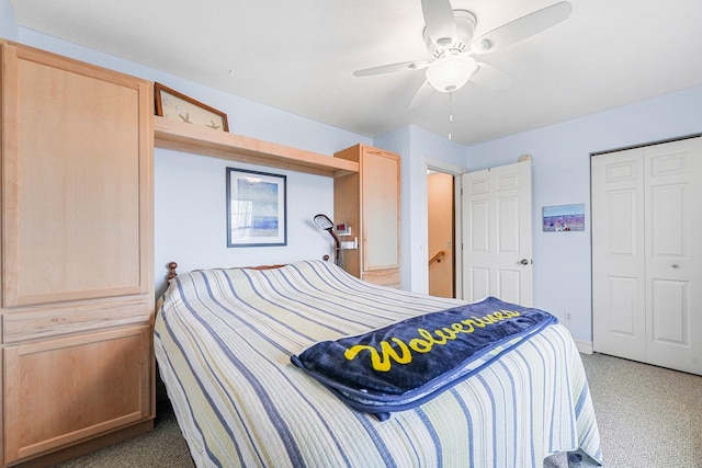 bedroom featuring carpet, ceiling fan, and a closet