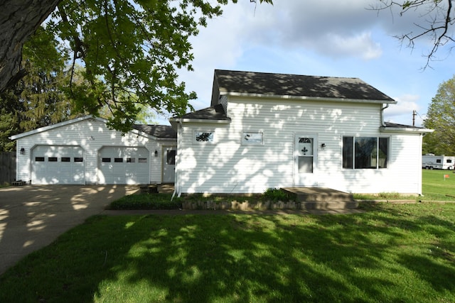 56193 Murray St, Mattawan, MI 49071 - view of front of property with an attached garage, driveway, and a front lawn