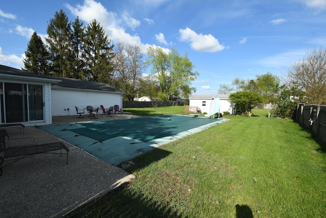 56193 Murray St, Mattawan, MI 49071 - view of yard featuring a fenced backyard, a patio, a fenced in pool, and an outbuilding
