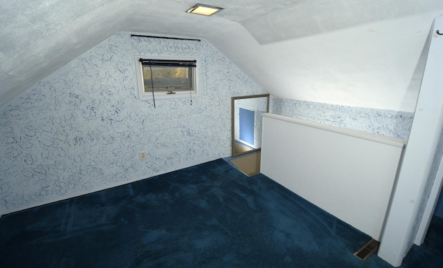 56193 Murray St, Mattawan, MI 49071 - bonus room featuring lofted ceiling, carpet, visible vents, and wallpapered walls