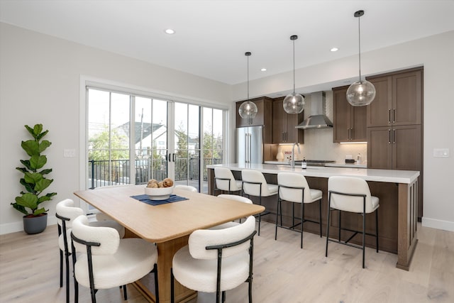 628 Maple St, Plymouth, MI 48170 - dining space featuring light wood-type flooring, baseboards, and recessed lighting