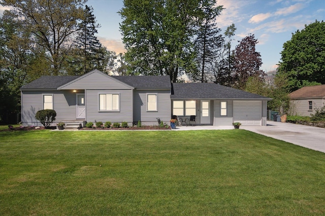 11389 Gold Arbor Rd, Plymouth, MI 48170 - single story home featuring driveway, a front yard, a garage, and roof with shingles