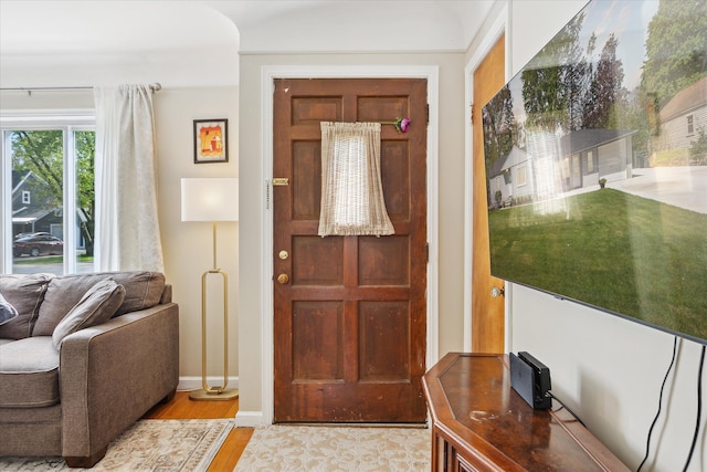 11389 Gold Arbor Rd, Plymouth, MI 48170 - entrance foyer featuring light wood-type flooring and baseboards