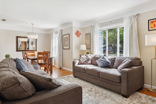 11389 Gold Arbor Rd, Plymouth, MI 48170 - living area featuring wood finished floors and baseboards
