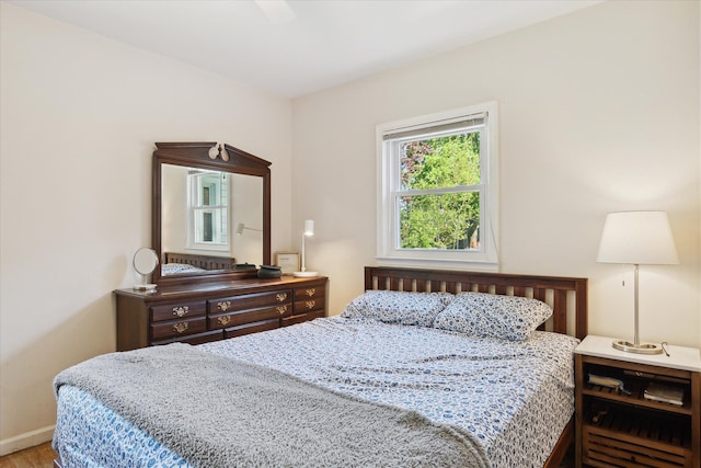 11389 Gold Arbor Rd, Plymouth, MI 48170 - bedroom featuring wood finished floors, baseboards, and ceiling fan