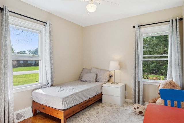 11389 Gold Arbor Rd, Plymouth, MI 48170 - carpeted bedroom with baseboards and a ceiling fan